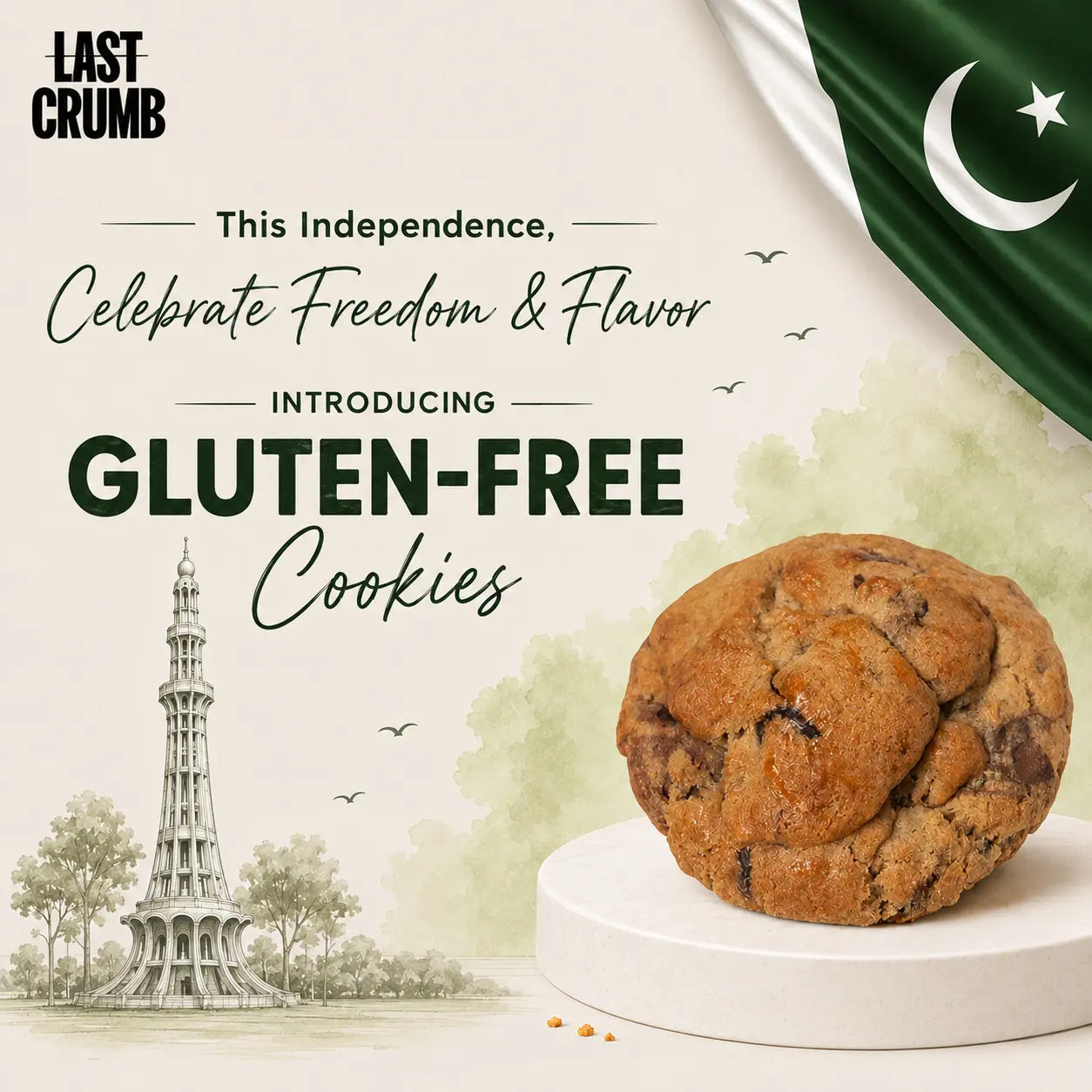 Promotional graphic for Last Crumb Gluten-Free Cookies celebrating Independence Day, featuring a golden-brown chocolate chip cookie on a white pedestal, a Pakistani flag, the Pakistan Tower illustration, and text reading 'This Independence, Celebrate Freedom & Flavor' and 'Introducing Gluten-Free Cookies'.